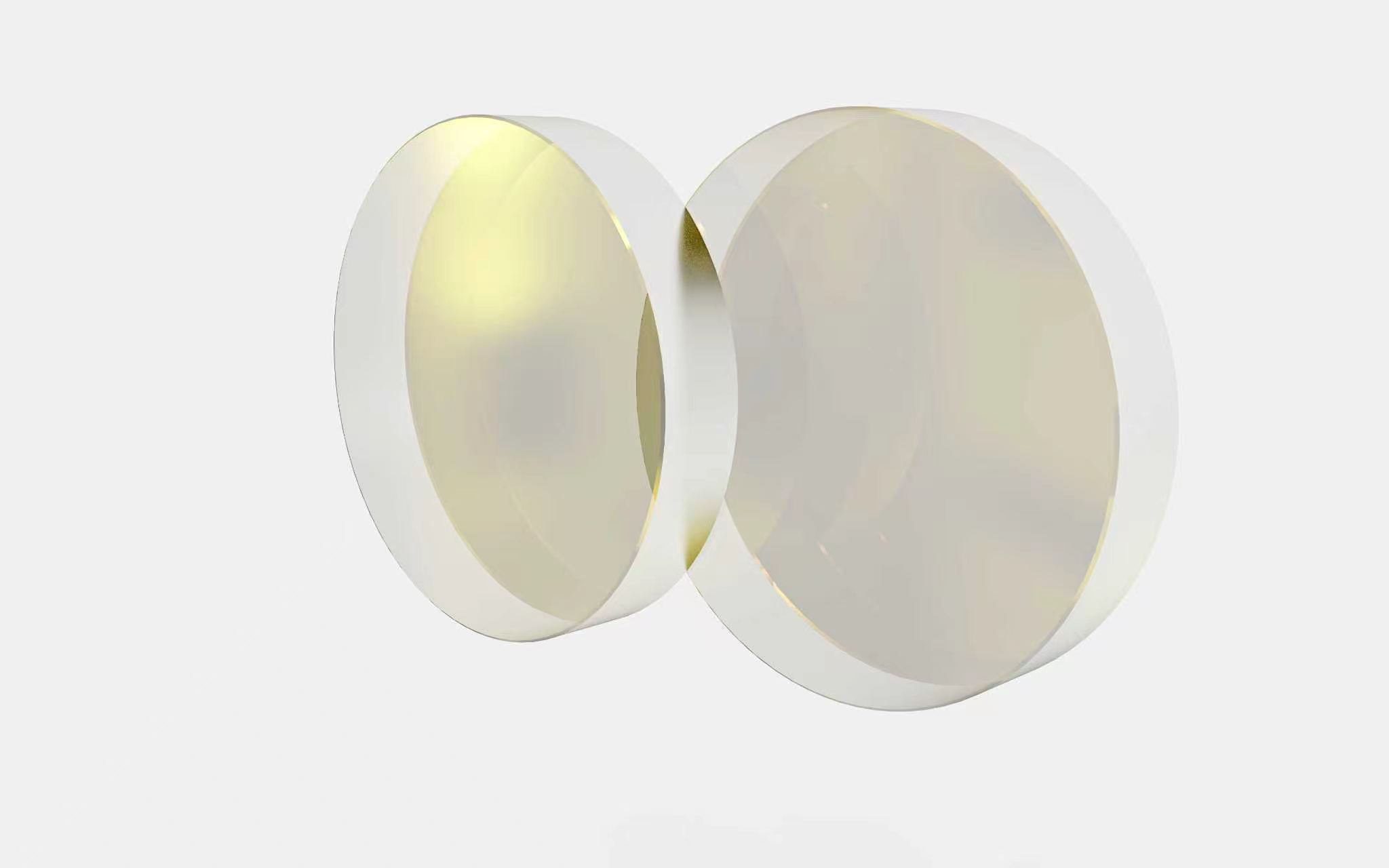 Close-up view of protective lens consumables for laser heads